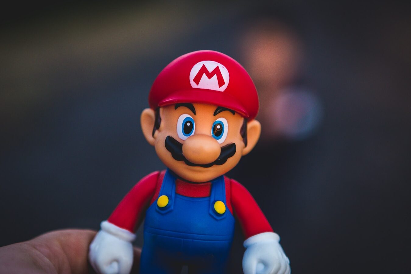 super mario in blue and red shirt figurine