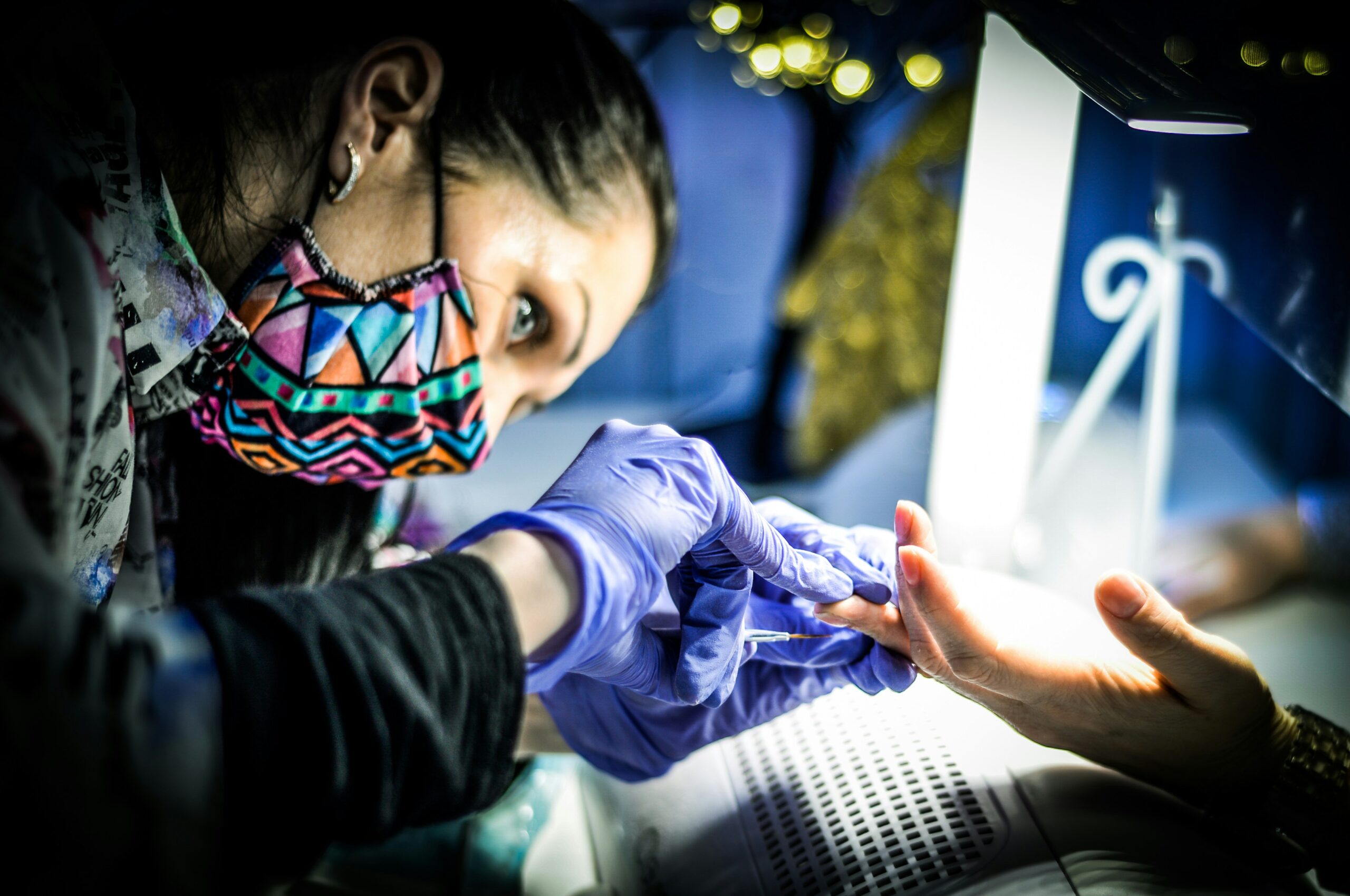 a woman wearing a face mask and gloves